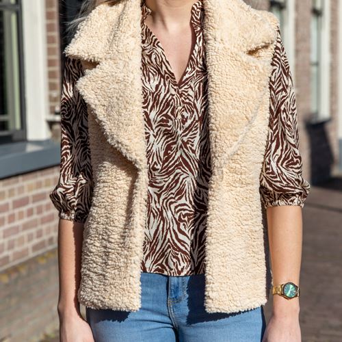Gilet combineren hoe draag je een gilet voor dames Scapino